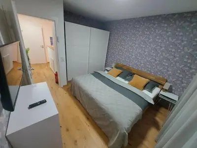 Ein Bett oder Betten in einem Zimmer der Unterkunft Unicorn Apartment