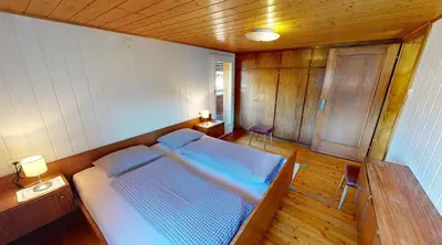 Ein Bett oder Betten in einem Zimmer der Unterkunft Ninis - Ferienhaus im Bregenzerwald