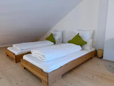 Ein Bett oder Betten in einem Zimmer der Unterkunft Gamsfels Balbina Galeriewohnung