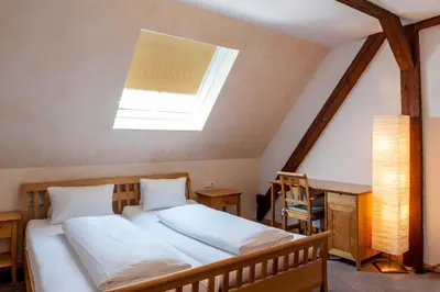 Ein Bett oder Betten in einem Zimmer der Unterkunft Gästehaus Brugger