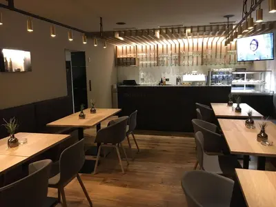 Ein Restaurant oder anderes Speiselokal in der Unterkunft Gästehaus Brugger