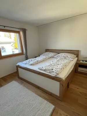 Ein Bett oder Betten in einem Zimmer der Unterkunft Haus Anna
