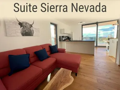 Ein Sitzbereich in der Unterkunft Eichen-Chalet