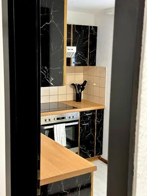 Küche/Küchenzeile in der Unterkunft Charmante Wohnung am Hafen