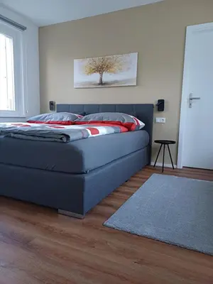 Ein Bett oder Betten in einem Zimmer der Unterkunft Ruhige Stadtwohnung, 107 m2