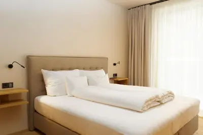 Ein Bett oder Betten in einem Zimmer der Unterkunft Heimat 1495m Appartement TYP 5 light