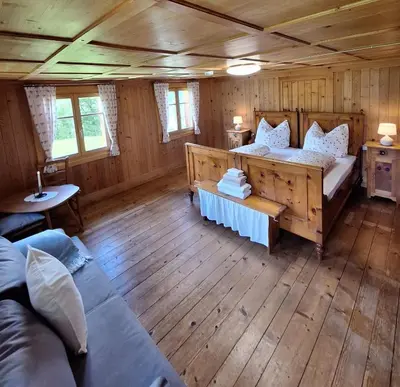 Ein Bett oder Betten in einem Zimmer der Unterkunft Zom Ruaba