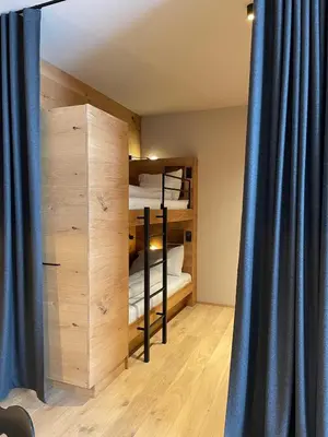 Ein Bett oder Betten in einem Zimmer der Unterkunft Heimat 1495m Appartement TYP 8
