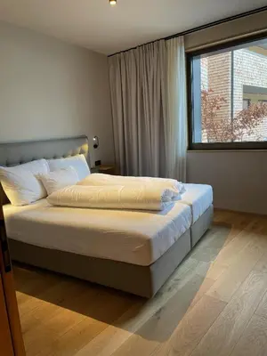 Ein Bett oder Betten in einem Zimmer der Unterkunft Heimat 1495m Appartement TYP 2 light