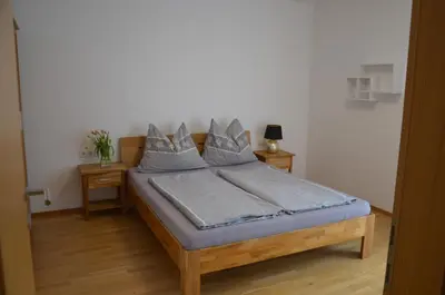 Ein Bett oder Betten in einem Zimmer der Unterkunft Ferienwohnung Freiraum