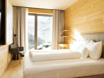 Ein Bett oder Betten in einem Zimmer der Unterkunft Wohnung in Schröcken bei Ski Arlberg