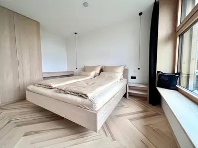 Ein Bett oder Betten in einem Zimmer der Unterkunft Luxusappartement hôamele - Ferienwohnung mit Genuss