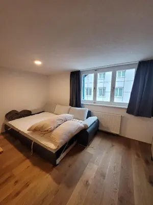 Ein Bett oder Betten in einem Zimmer der Unterkunft Waibel Appartement Bezau