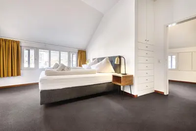 Ein Bett oder Betten in einem Zimmer der Unterkunft Familienferienwohnung HEIMat