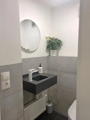 Ein Badezimmer in der Unterkunft Haus Fernweh