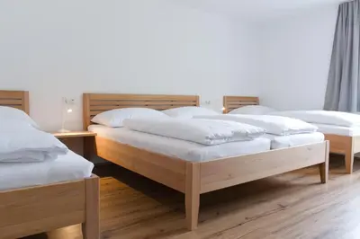 Ein Bett oder Betten in einem Zimmer der Unterkunft B31 - Ferienwohnung in Bezau