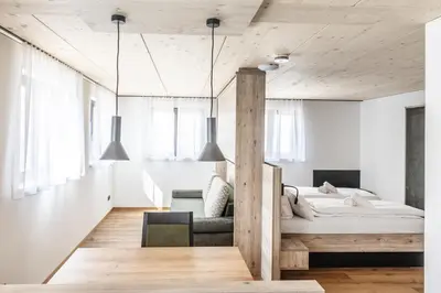 Ein Bett oder Betten in einem Zimmer der Unterkunft Alpen Krone by Maier - Dornbirn