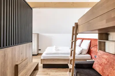 Ein Bett oder Betten in einem Zimmer der Unterkunft Alpen Krone by Maier - Dornbirn