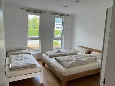 Ein Bett oder Betten in einem Zimmer der Unterkunft Kaiserstrand Apartment Bodensee - Lake Constance, Lochau - Bregenz, Austria