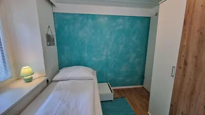Ein Bett oder Betten in einem Zimmer der Unterkunft homy Bludenz Downtown Suites