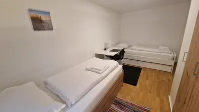 Ein Bett oder Betten in einem Zimmer der Unterkunft homy Bludenz Downtown Suites