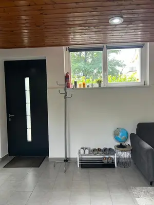 Ein Sitzbereich in der Unterkunft Ferienwohnung in Lochau