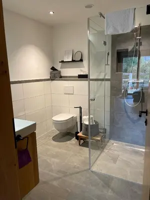 Ein Badezimmer in der Unterkunft Rosa Alpina Appartement