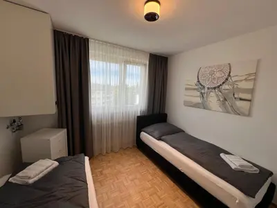 Ein Bett oder Betten in einem Zimmer der Unterkunft rs44 Apartments über den Dächern von Bregenz
