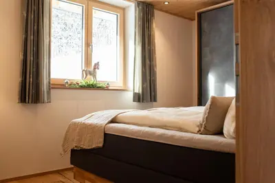 Ein Bett oder Betten in einem Zimmer der Unterkunft Appartement Bergwild