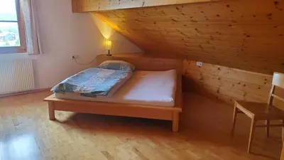 Ein Bett oder Betten in einem Zimmer der Unterkunft Ferienwohnung Peter