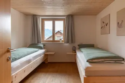 Ein Bett oder Betten in einem Zimmer der Unterkunft Ferienwohnungen am Dorfbach