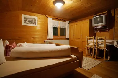 Ein Bett oder Betten in einem Zimmer der Unterkunft Apartment Jaegerhaus
