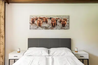 Ein Bett oder Betten in einem Zimmer der Unterkunft homy MontaVista - 300m zur Golmerbahn