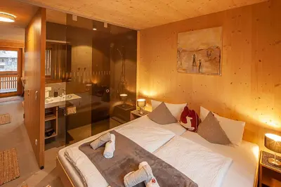 Ein Bett oder Betten in einem Zimmer der Unterkunft Eichen Lodge Mellau