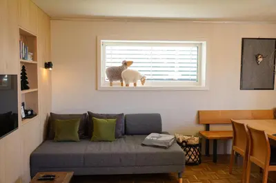 Ein Sitzbereich in der Unterkunft Ferienwohnung Am Bach, Riefensberg, Bregenzerwald