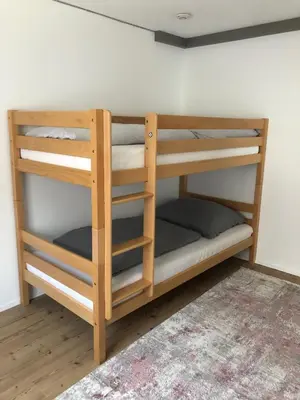 Ein Bett oder Betten in einem Zimmer der Unterkunft Ursprungshaus - Nuss und Traube