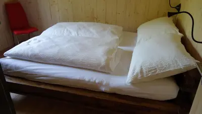 Ein Bett oder Betten in einem Zimmer der Unterkunft Erwins Ferien Paradies