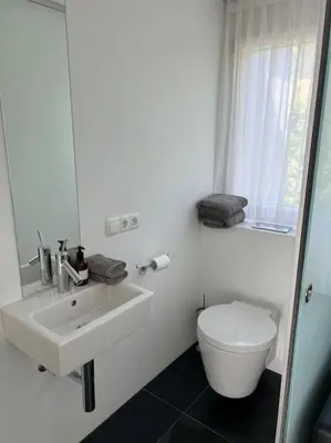 Ein Badezimmer in der Unterkunft Schickes Appartement im Zentrum
