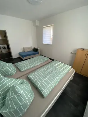 Ein Bett oder Betten in einem Zimmer der Unterkunft Marija Apartment