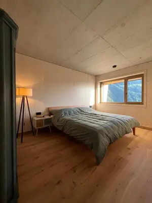 Ein Bett oder Betten in einem Zimmer der Unterkunft Walsergrat Appartements
