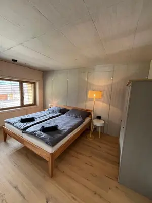 Ein Bett oder Betten in einem Zimmer der Unterkunft Walsergrat Appartements