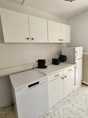 Küche/Küchenzeile in der Unterkunft Zeitlose Altbauwohnung Bregenz am See