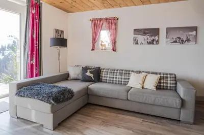 Ein Sitzbereich in der Unterkunft Haus Dorfblick