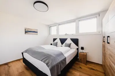 Ein Bett oder Betten in einem Zimmer der Unterkunft Ferienhaus Sandra mit Balkon -Nähe Bodensee&Pfänder