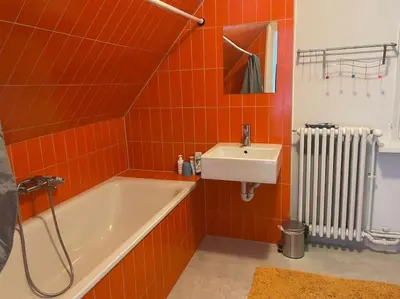 Ein Badezimmer in der Unterkunft Dachwohnung im Villenviertel