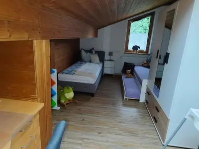 Ein Bett oder Betten in einem Zimmer der Unterkunft Ferienwohnung Marianne