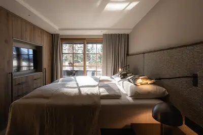 Ein Bett oder Betten in einem Zimmer der Unterkunft Bergmähder - Alpine Residence