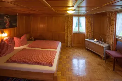 Ein Bett oder Betten in einem Zimmer der Unterkunft Alps Hoamat Ferienchalet