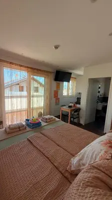 Ein Bett oder Betten in einem Zimmer der Unterkunft Blaue Lagune-Ferien mit Stil