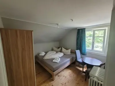 Ein Bett oder Betten in einem Zimmer der Unterkunft Lakeview Apartment Bregenz Bodensee